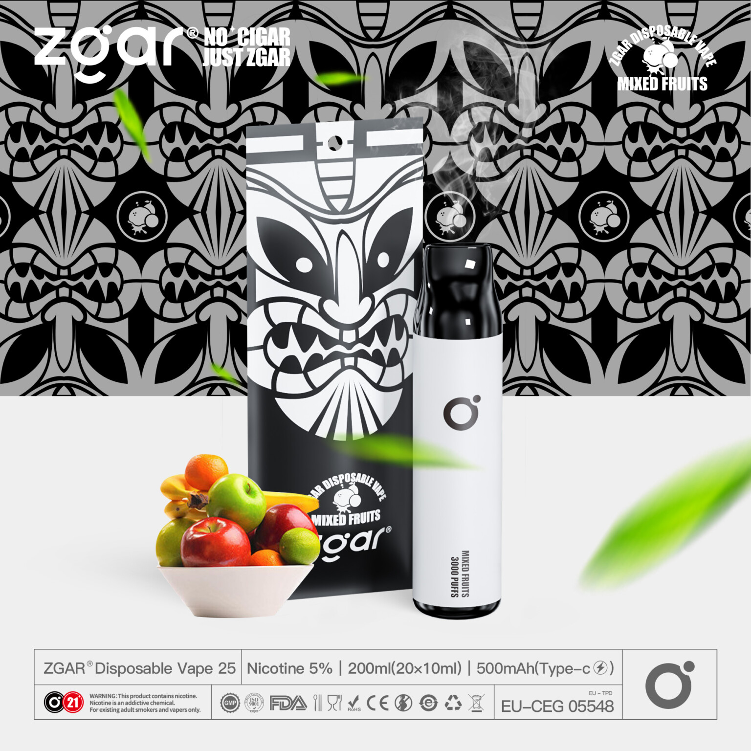 A disposable vape device with a black and white design, featuring a tiki mask pattern, a bowl of mixed fruits, and branding for "ZGAR."
