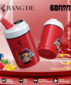 A red disposable vape device labeled 'BANG DE 60000 Puffs' featuring a cartoon monkey with smoke, showcasing its 'Three Flavors' of Red Bull and Strawberry Banana, alongside icons for dual coil, intelligent power indicator, and digital oil indicator.