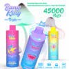 Publicité pour les cigarettes électroniques jetables Bang King Triple comprenant trois appareils de vapotage colorés, mettant en valeur un commutateur de saveur 3 en 1, 45 000 bouffées, une batterie de 650 mAh, 15 ml de liquide par saveur et une charge de type C.